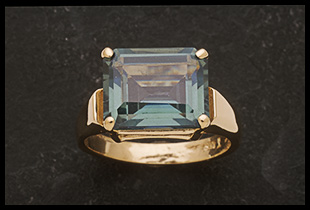 East to West Design Ring with Emerald Cut Blue Spinel Stone